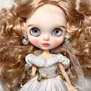 Charming Doll with White Gown and Blonde Curls